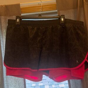 Danskin Now grey and pink work out shorts size XL(16-18)